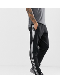 schwarze und weiße Jogginghose von adidas