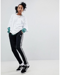 schwarze und weiße Jogginghose von adidas Originals