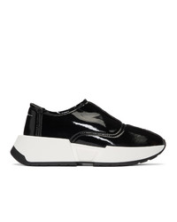 schwarze und weiße klobige Slip-On Sneakers