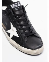 schwarze und weiße Leder niedrige Sneakers mit Sternenmuster von Golden Goose