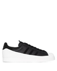 schwarze und weiße Leder niedrige Sneakers von adidas