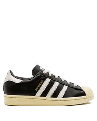 schwarze und weiße Leder niedrige Sneakers von adidas