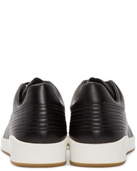 schwarze und weiße Leder niedrige Sneakers von Alexander McQueen