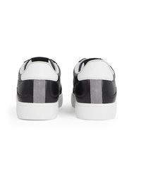 schwarze und weiße Leder niedrige Sneakers von Calvin Klein Jeans