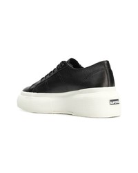 schwarze und weiße Leder niedrige Sneakers von Superga