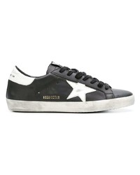 schwarze und weiße Leder niedrige Sneakers von Golden Goose Deluxe Brand