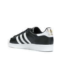 schwarze und weiße Leder niedrige Sneakers von adidas