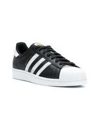 schwarze und weiße Leder niedrige Sneakers von adidas