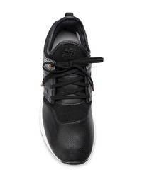 schwarze und weiße Leder niedrige Sneakers von New Balance