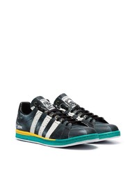 schwarze und weiße Leder niedrige Sneakers von Adidas By Raf Simons