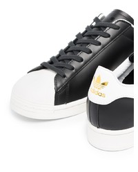 schwarze und weiße Leder niedrige Sneakers von adidas