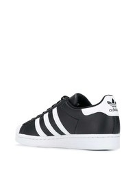 schwarze und weiße Leder niedrige Sneakers von adidas