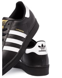 schwarze und weiße Leder niedrige Sneakers von adidas