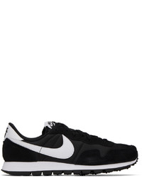 schwarze und weiße Leder Sportschuhe von Nike