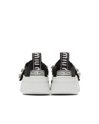 schwarze und weiße niedrige Sneakers von Miu Miu