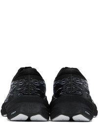 schwarze und weiße niedrige Sneakers von Asics