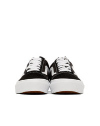 schwarze und weiße niedrige Sneakers von Vans