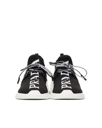 schwarze und weiße niedrige Sneakers von Prada