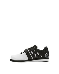 schwarze und weiße niedrige Sneakers von Reebok