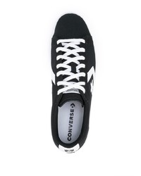 schwarze und weiße Segeltuch niedrige Sneakers mit Sternenmuster von Converse