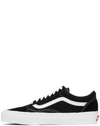 schwarze und weiße Segeltuch niedrige Sneakers von Vans