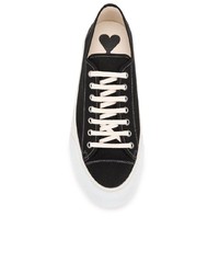 schwarze und weiße Segeltuch niedrige Sneakers von Ami