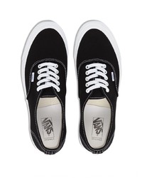 schwarze und weiße Segeltuch niedrige Sneakers von Vans