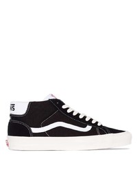 schwarze und weiße Segeltuch niedrige Sneakers von Vans