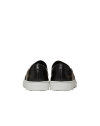schwarze und weiße Slip-On Sneakers aus Leder von Woman by Common Projects