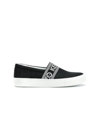 schwarze und weiße Slip-On Sneakers aus Segeltuch