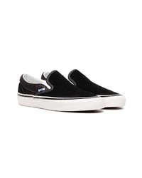 schwarze und weiße Slip-On Sneakers aus Segeltuch von Vans