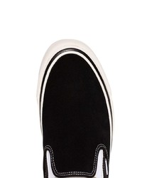 schwarze und weiße Slip-On Sneakers aus Segeltuch von Vans