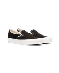 schwarze und weiße Slip-On Sneakers aus Segeltuch von Vans