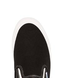 schwarze und weiße Slip-On Sneakers aus Segeltuch von Vans