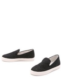 schwarze und weiße Slip-On Sneakers von Ash