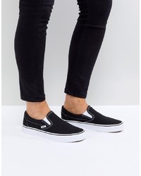schwarze und weiße Slip-On Sneakers von Vans
