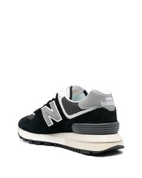 schwarze und weiße Sportschuhe von New Balance