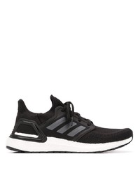 schwarze und weiße Sportschuhe von adidas