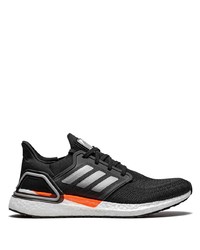 schwarze und weiße Sportschuhe von adidas