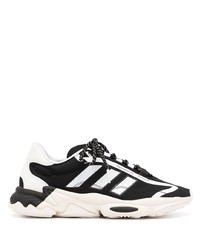 schwarze und weiße Sportschuhe von adidas