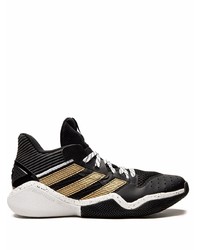 schwarze und weiße Sportschuhe von adidas