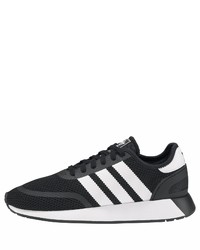 schwarze und weiße Sportschuhe von adidas Originals