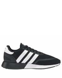 schwarze und weiße Sportschuhe von adidas Originals