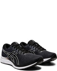 schwarze und weiße Sportschuhe von Asics