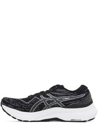 schwarze und weiße Sportschuhe von Asics