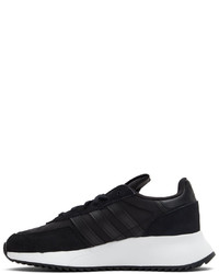 schwarze und weiße Sportschuhe von adidas Originals