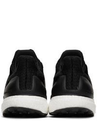 schwarze und weiße Sportschuhe von adidas Originals