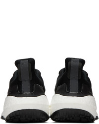schwarze und weiße Sportschuhe von adidas Originals