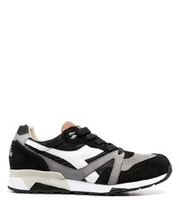 schwarze und weiße Sportschuhe von Diadora