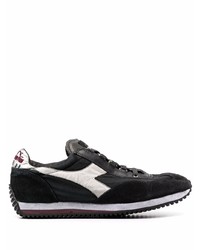 schwarze und weiße Sportschuhe von Diadora